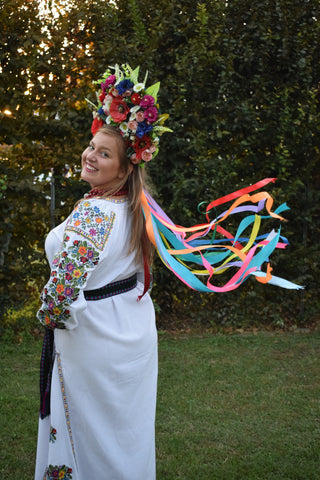 woman in colorful Viking wedding gown by Mariana Sandulovych on Unsplash.com