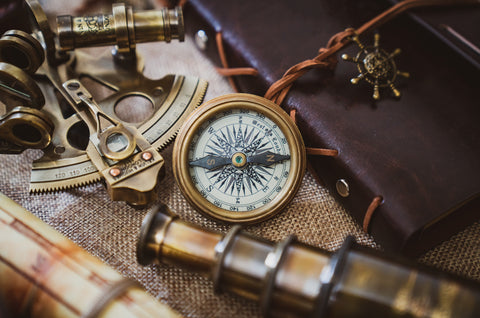 compass and navigational tools by Sesha Reddy Kovvuri on Unsplash.cpm