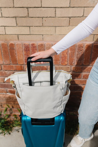 Travel bag; bag with luggage sleeve