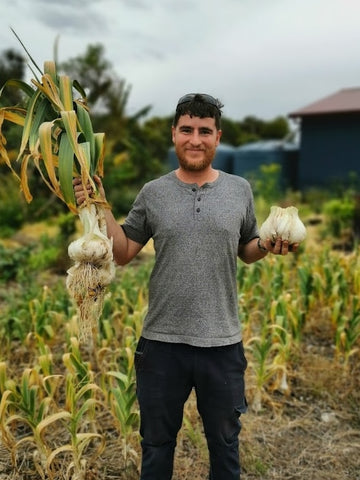 Jon Thompson holds the Australian record for the largest Elephant garlic.