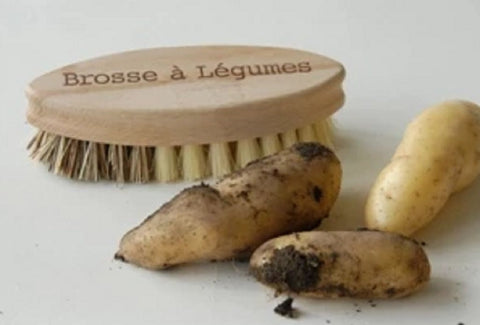 Vegetable brush used for cleaning potatoes