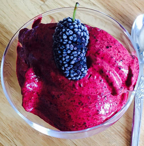 Mulberry sorbet in a glass bowl
