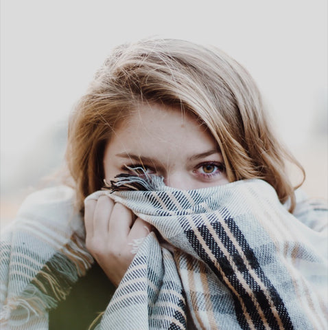 Lady wearing brown scarf