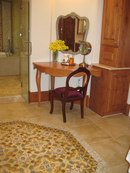 In this master bath, a cement tile rug is created using  Avente's Traditional Sosua pattern