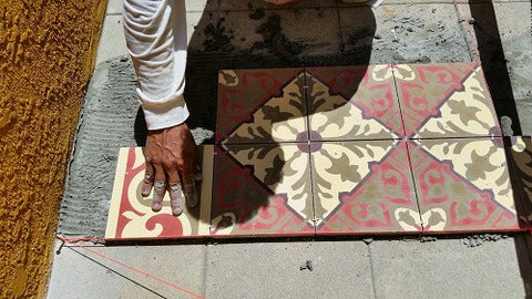 Level cement tile using your hand