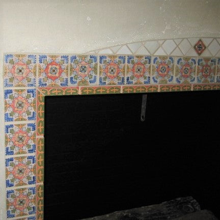 Spanish Andalucia Tiles are Handpainted and Frame the Firebox