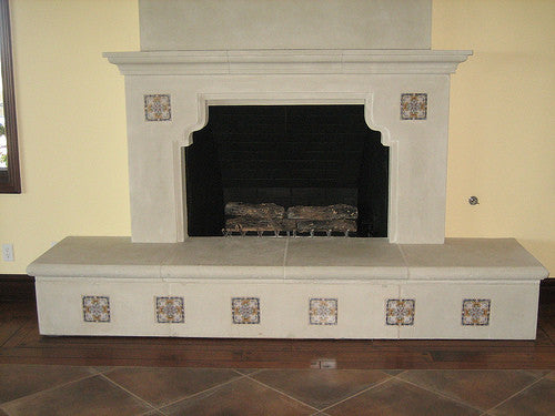 A fireplace using hand painted Spanish Tile