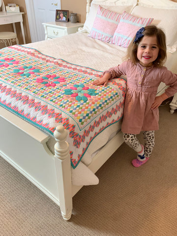 Quilted coverlet made with Mister Domestic's Playroom Party Fabrics by Art Gallery Fabrics