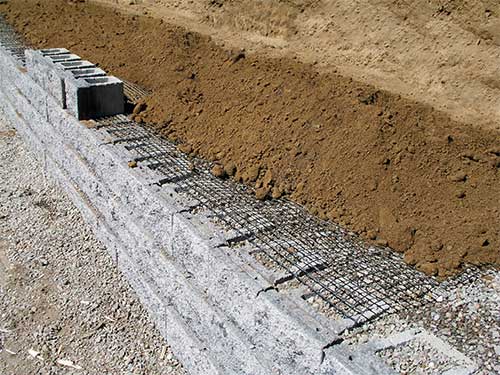 Retaining Wall with Geogrid Installation