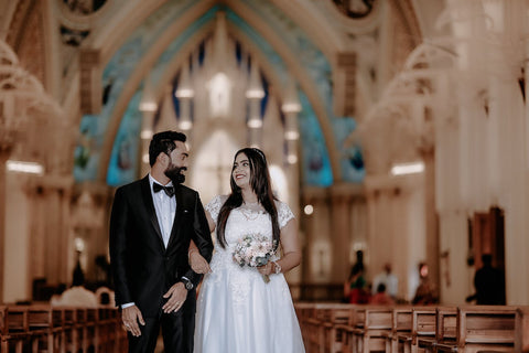 Couple getting married in a Catholic Church