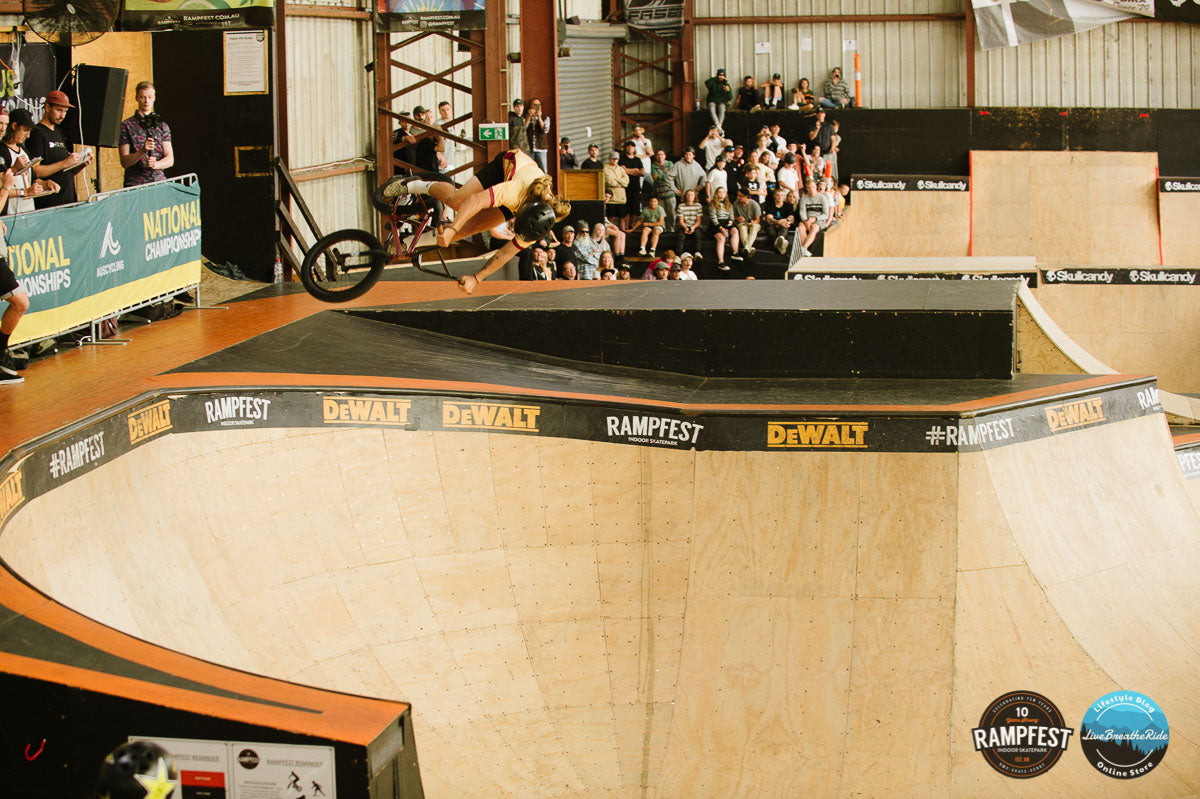 Jason Watts launching a huge transfer in the bowl at Rampfest Indoor Skatepark