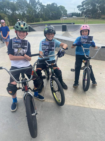 13 & Under Category Podium Tol Papadimas, Sam De Costa and Logan Markwell hold up their prizes at Stop 2  of the Victorian Freestyle BMX State Championship Qualifying