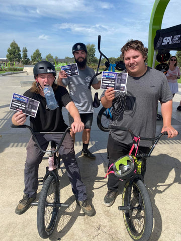 Open Men's podium Aidan Vrins, Jonathan Collins and Ethan Jones hold up their prizes from Round 2 of the Victorian State Freestyle BMX Championship Qualifying