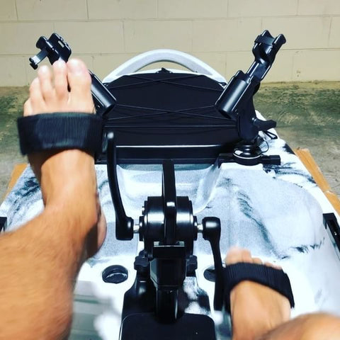 feet strapped on pedals