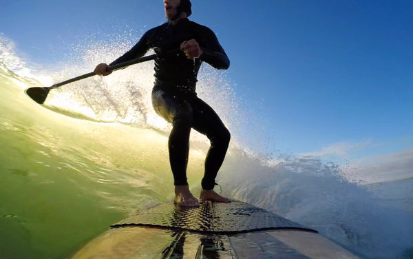 Surf stance on stand up paddle board