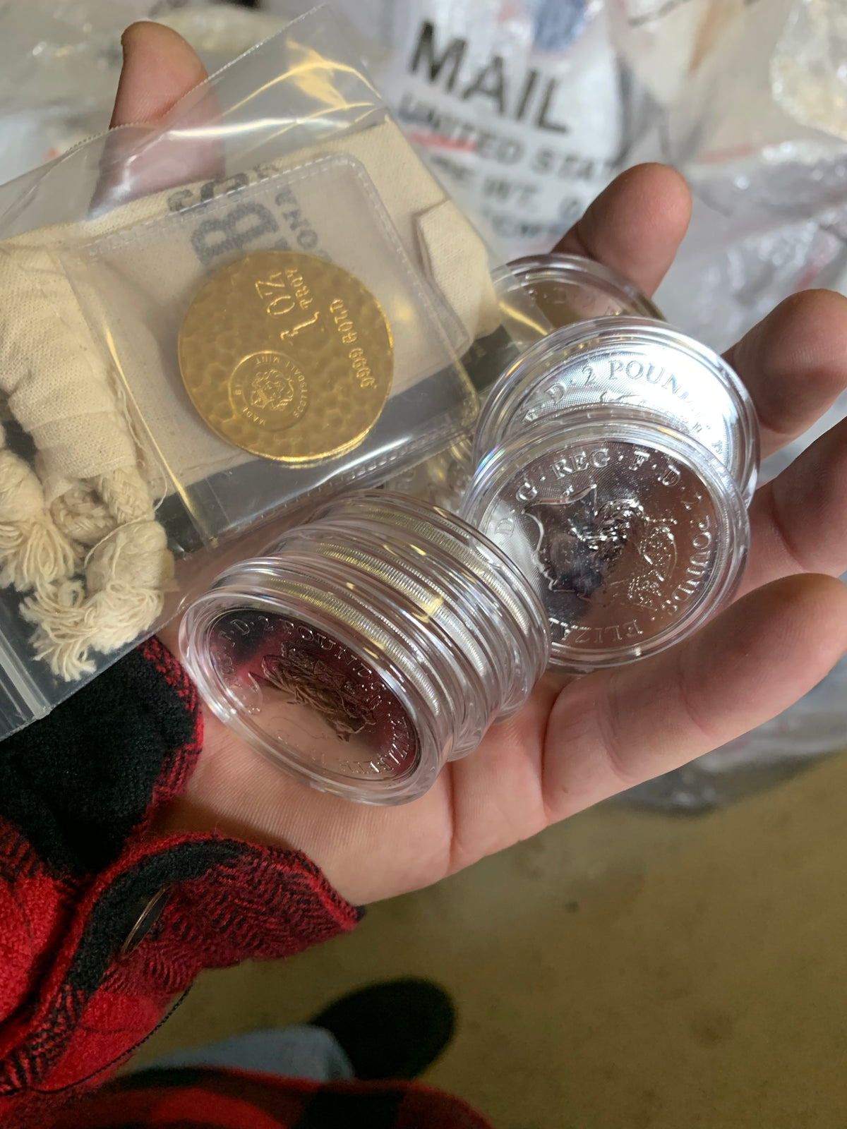 Handful of gold and silver coins