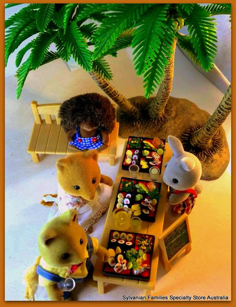 Sylvanian Families under coconut palms tropical beach party bento box