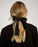 Bows in hair hairstyle trend 2024