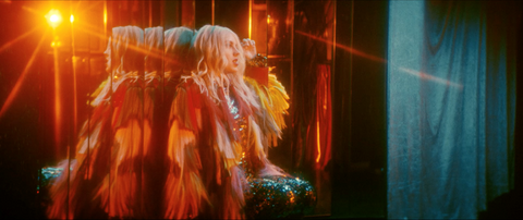 Izzy B from Black Honey wearing sequin flares