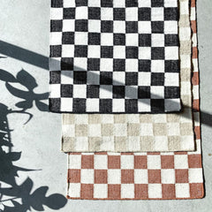 Checkered study nook rug idea