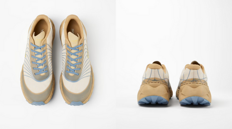 A pair of performance trail running shoes by NNormal in pale yellow and blue as seen from above and directly in front.