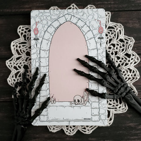 Spooky cute vampire's castle dungeon themed window notepad.