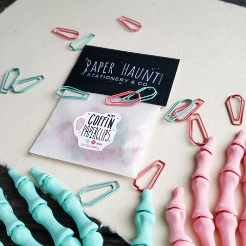 pastel goth blue and pink coffin shaped paperclips
