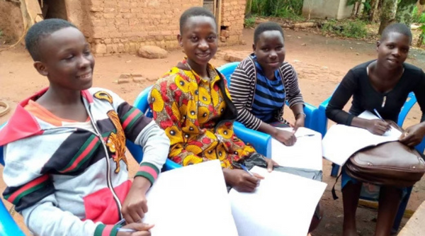 Students in Uganda doing Zoom lessons.