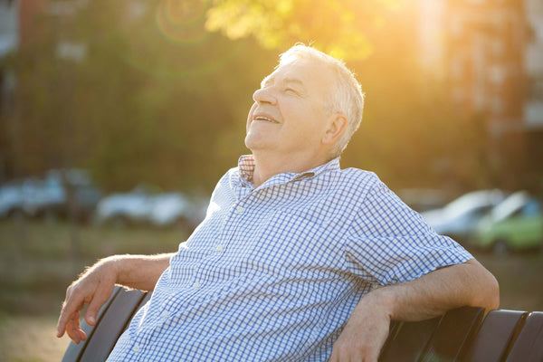 Old man taking a sunbath