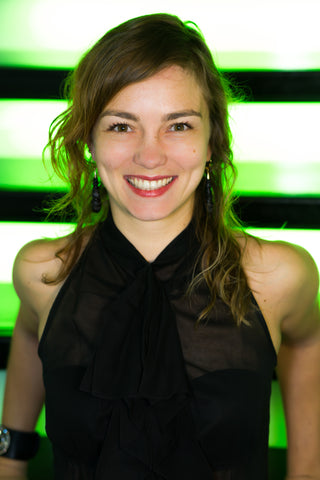 Alchimie Forever CEO Ada Polla smiling in black dress