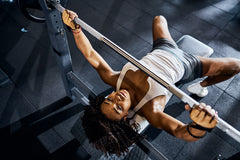 Female doing Chest Press