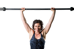 Female doing Barbell Overhead Press