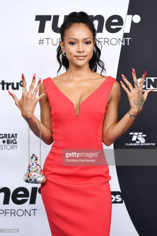 Karrueche Tran wears Seven Saints Infinite Love pave ring