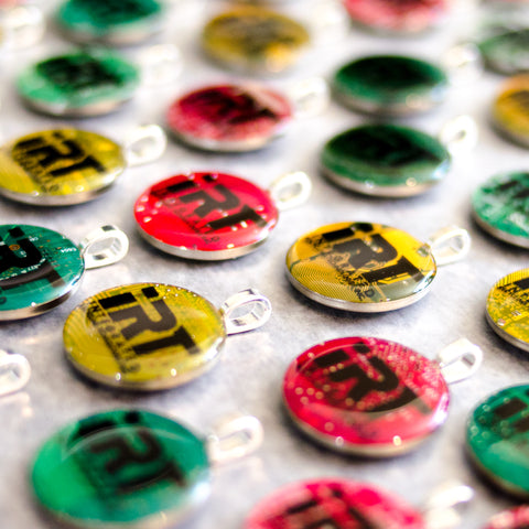 red yellow and green branded circuit board keychains for tech corporate gifting