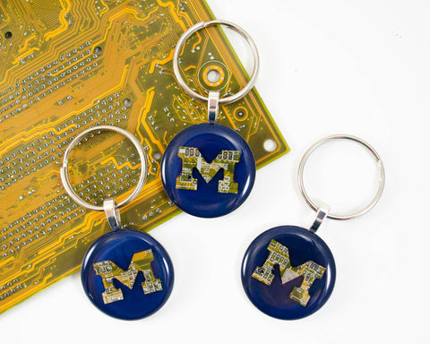 Custom made handmade M keychains for the university of Michigan made from recycled circuit boards