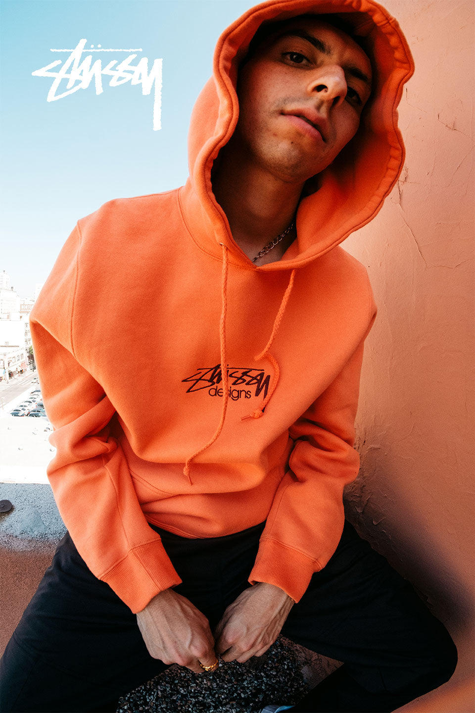 orange stussy jumper