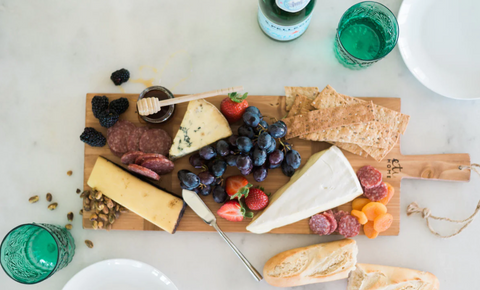 cutting board with cheese