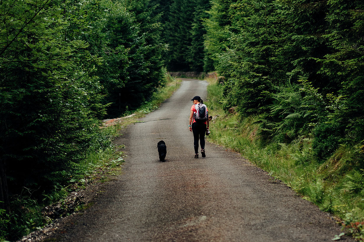 Woman and Dog on Hike