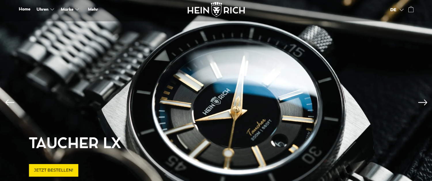 Das Bild zeigt die Website von Heinrich. Zu sehen ist eine Großaufnahme einer Uhr.