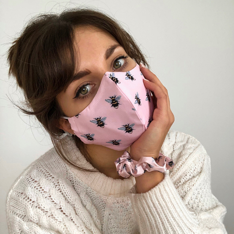 honey bee face covering and scrunchie on girl