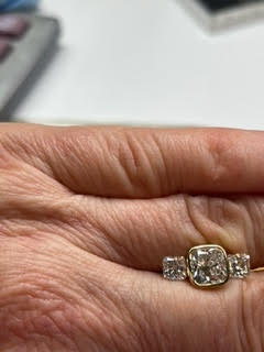 Displaying diamonds on my finger for client.