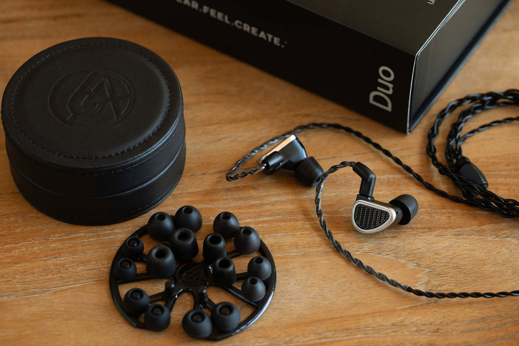 64 Audio Duo In-Ear Monitor Headphones with ear tips and packaging