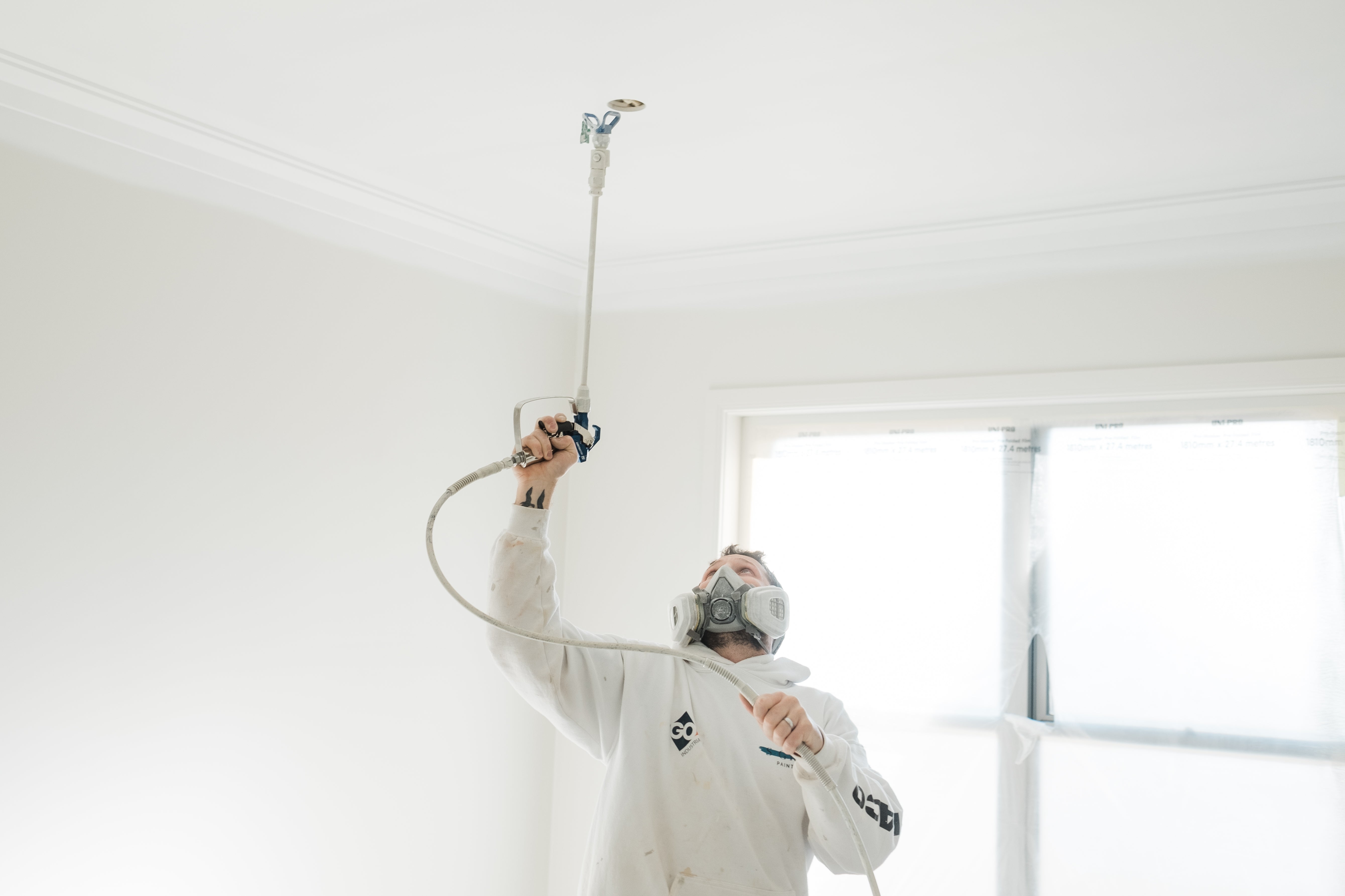 Ceiling painting with Graco spray tip