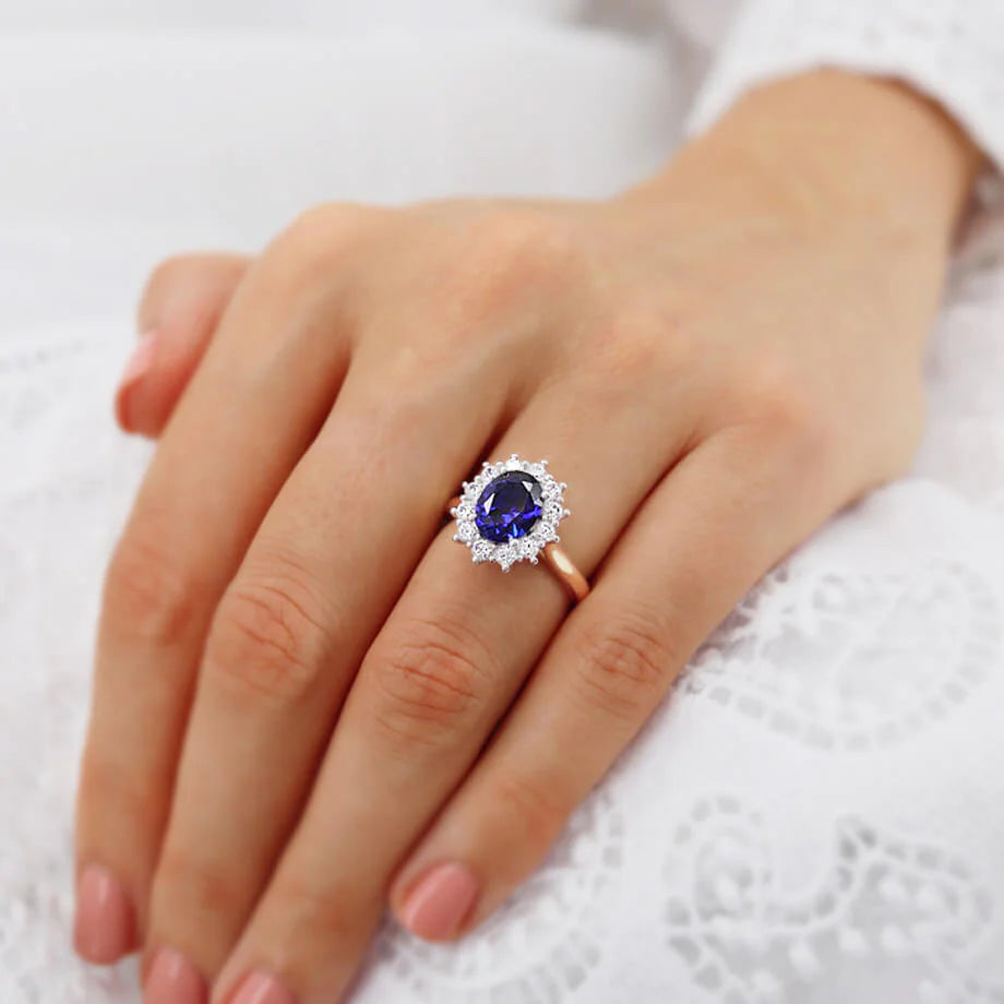 The Lily Arkwright Diana Ring Blue Sapphire Oval cut Chatham Gemstone with lab grown Diamond Halo 