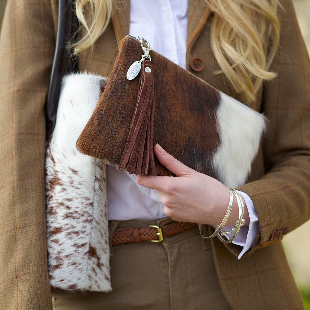 cowhide clutch bag