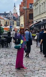 Indre strolling the quaint old town streets in Lithuania