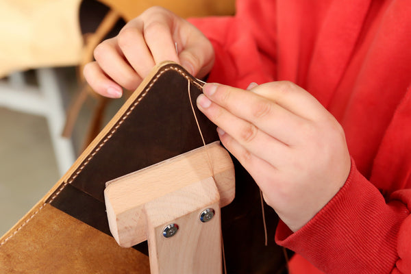 hand sewing leather portfolio