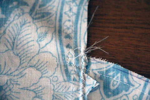 Sew side seam just outside the pocket seam