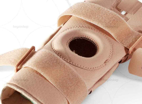 High-quality Breathable Neoprene and dense foam padded donut with removable hinged metal stays.Hinged Knee Stabilizer (Breathable Neoprene) 1031 by Oppo Medica.