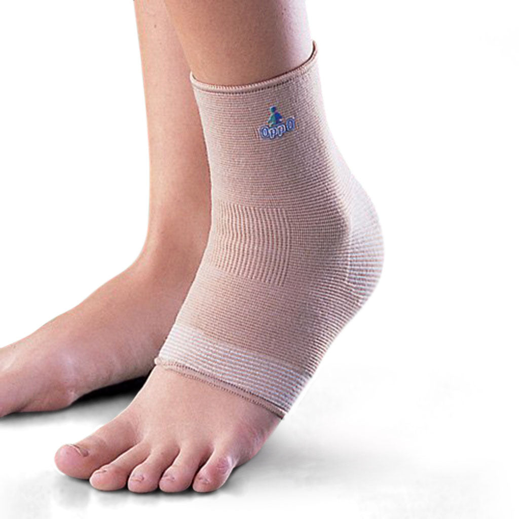 Oppo Ankle Support Sleeve with a 4-way stretch fabric for weak or sprained ankles as worn. Product Code 2004